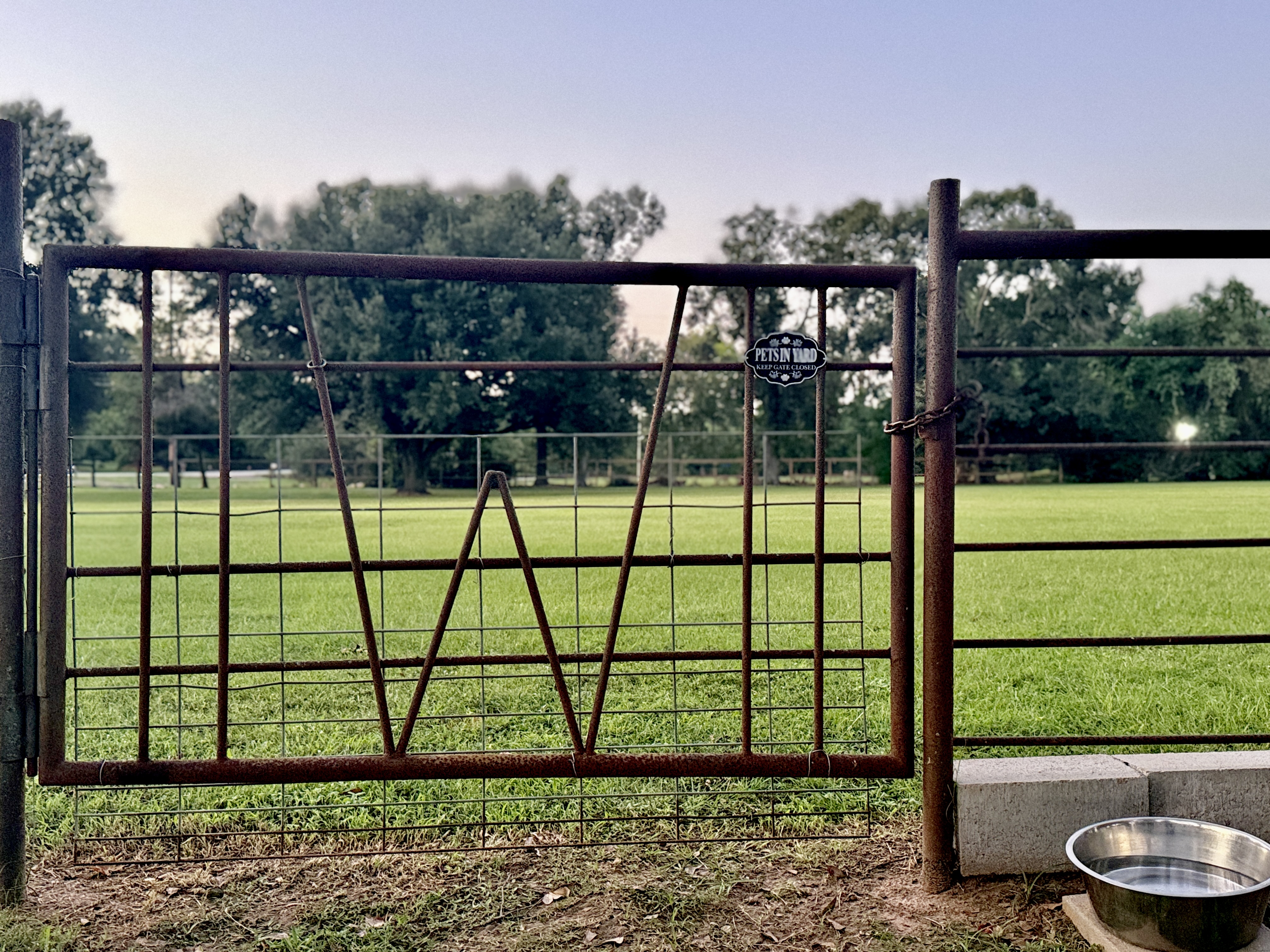 Secure entrance gate to dog training facility